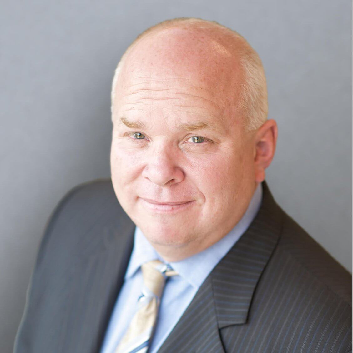Photo of Andy Charles, President and Chief Executive Officer.